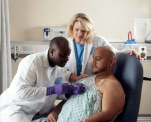 man receiving chemotherapy treatment