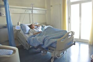 patient sitting in a hospital bed
